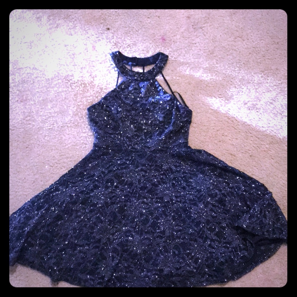 A navy blue dress with sparkles